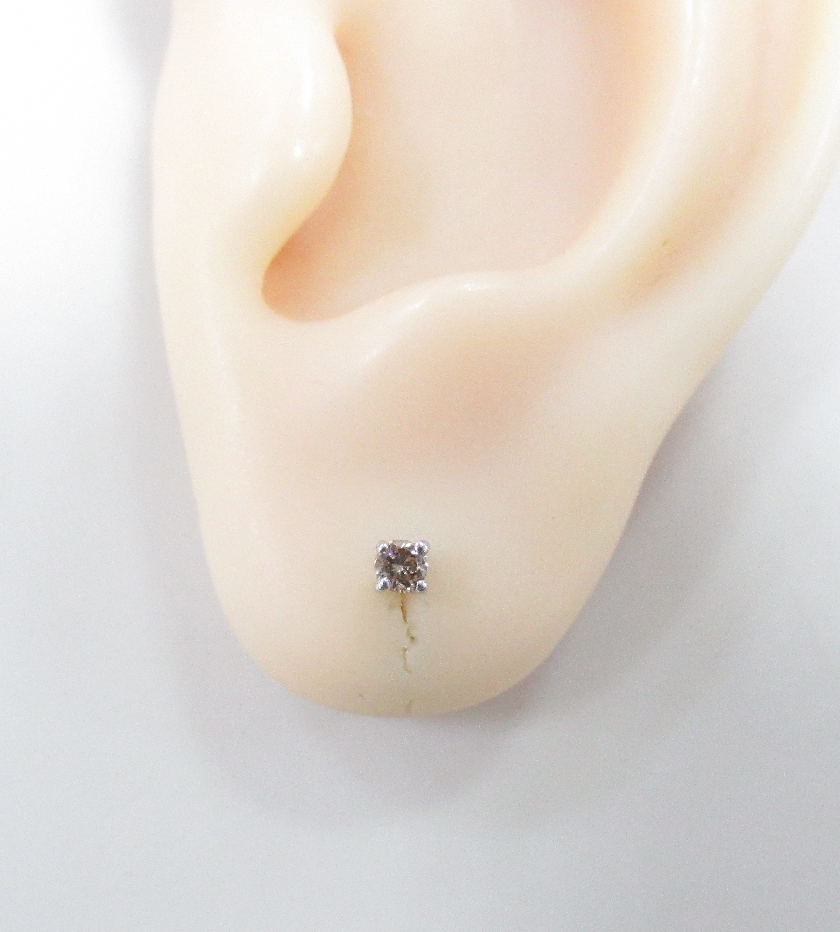 Серебряные серьги 925 пробы; вставки 2 Бр.коньяч.Кр-57 0,14ct 6/5;